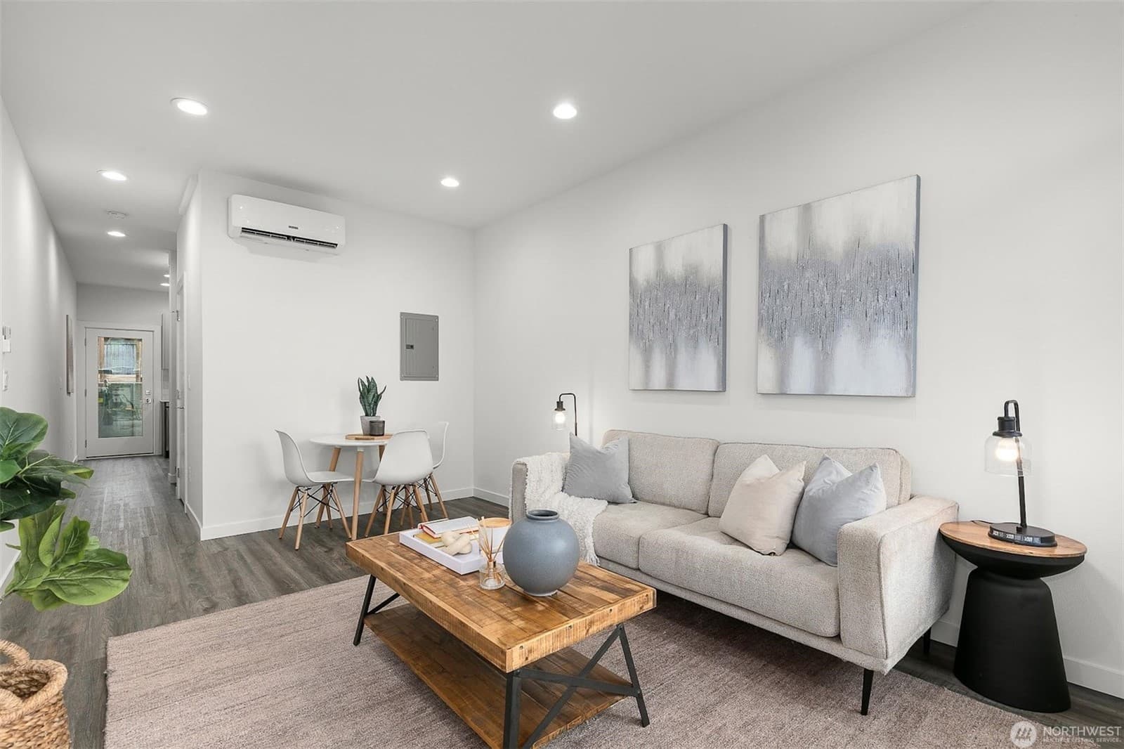 Living and dining area, looking back toward the entry