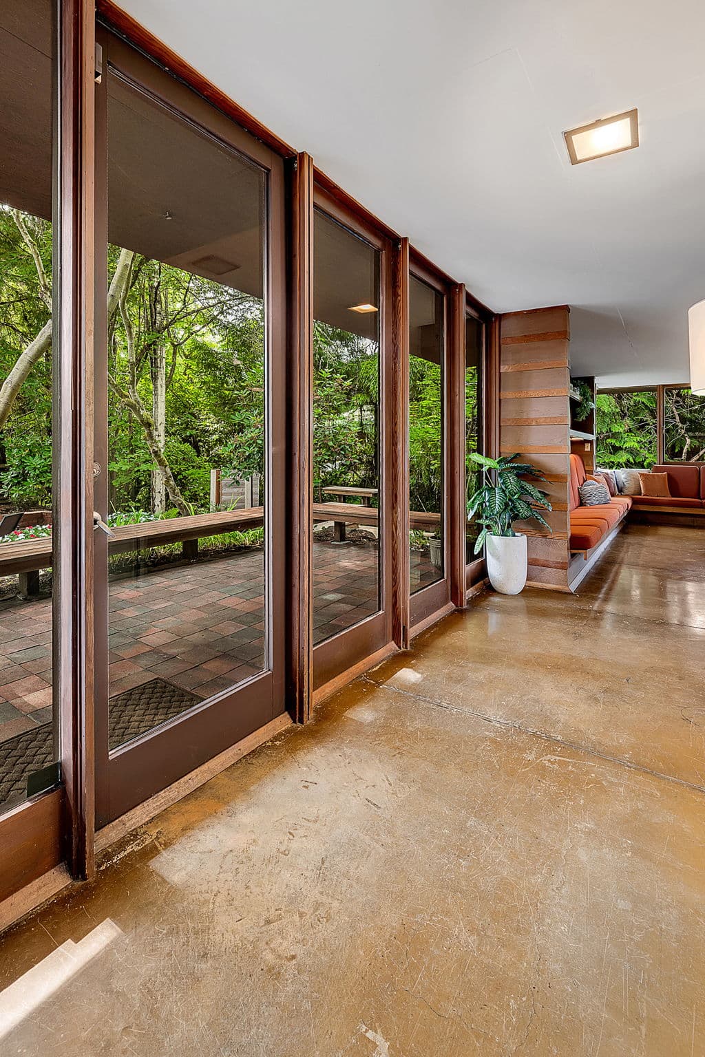 Looking down the glazed wall on polished concrete floors